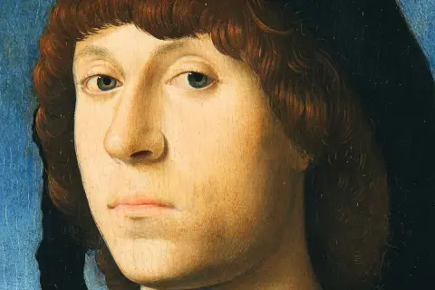 Portrait d'un jeune homme aux cheveux bruns bouclés, œuvre d'un peintre connu. Son regard est intense, le fond bleu et noir accentue son visage.
