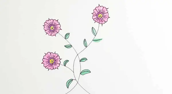 Un dessin facile pour enfant : trois jolies fleurs roses aux cœurs jaunes, avec des tiges vertes et des feuilles.