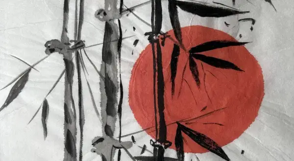 Peinture style japonais : tiges de bambou noires et grises sur fond blanc, avec un soleil rougeoyant.