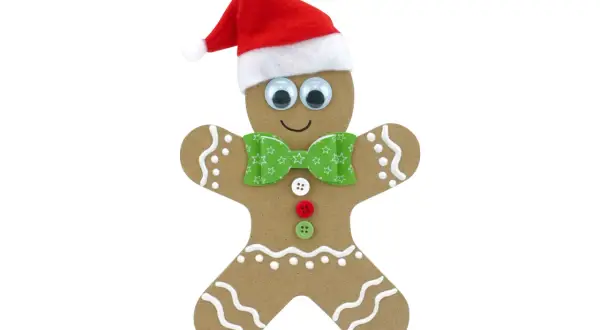 Un joyeux dessin bonhomme pain d'épice, coiffé d'un bonnet de Père Noël, avec des yeux rigolos et un nœud papillon vert.