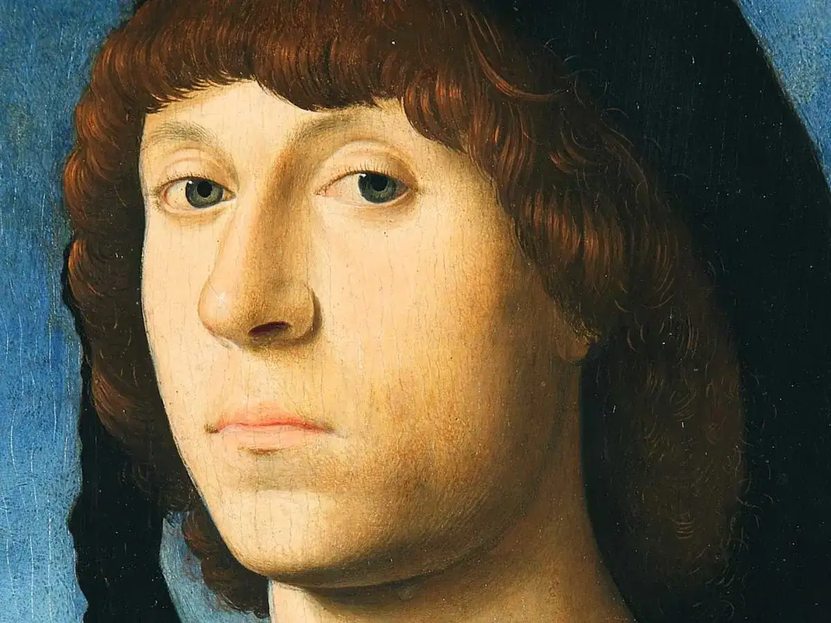 Portrait d'un jeune homme aux cheveux bruns bouclés, œuvre d'un peintre connu. Son regard est intense, le fond bleu et noir accentue son visage.