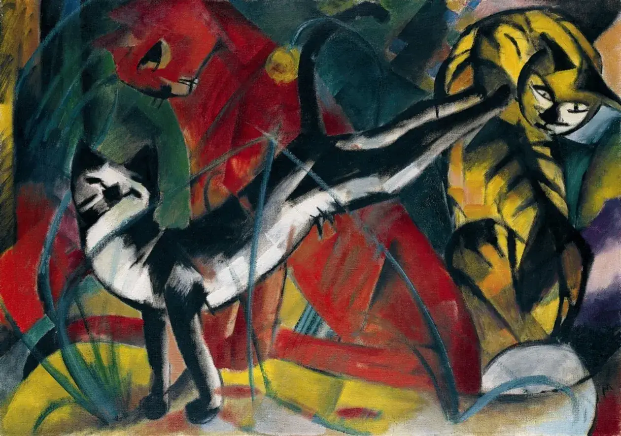 Trois chats aux formes abstraites, dans un style rappelant Franz Marc, se meuvent dans un tourbillon de couleurs vives.